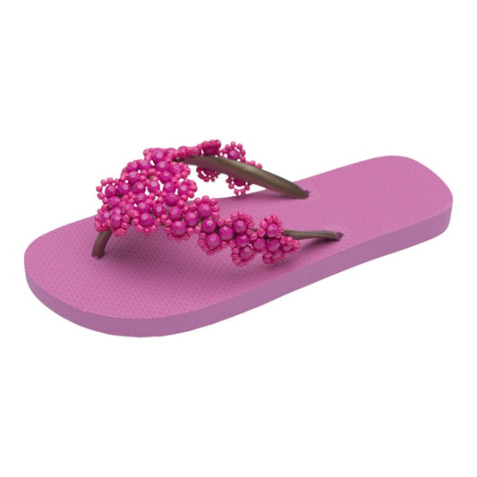 Stylische Chanclas mit handverzierten pinken Perlen – perfekt für Sommer, Strand und feminine Looks.