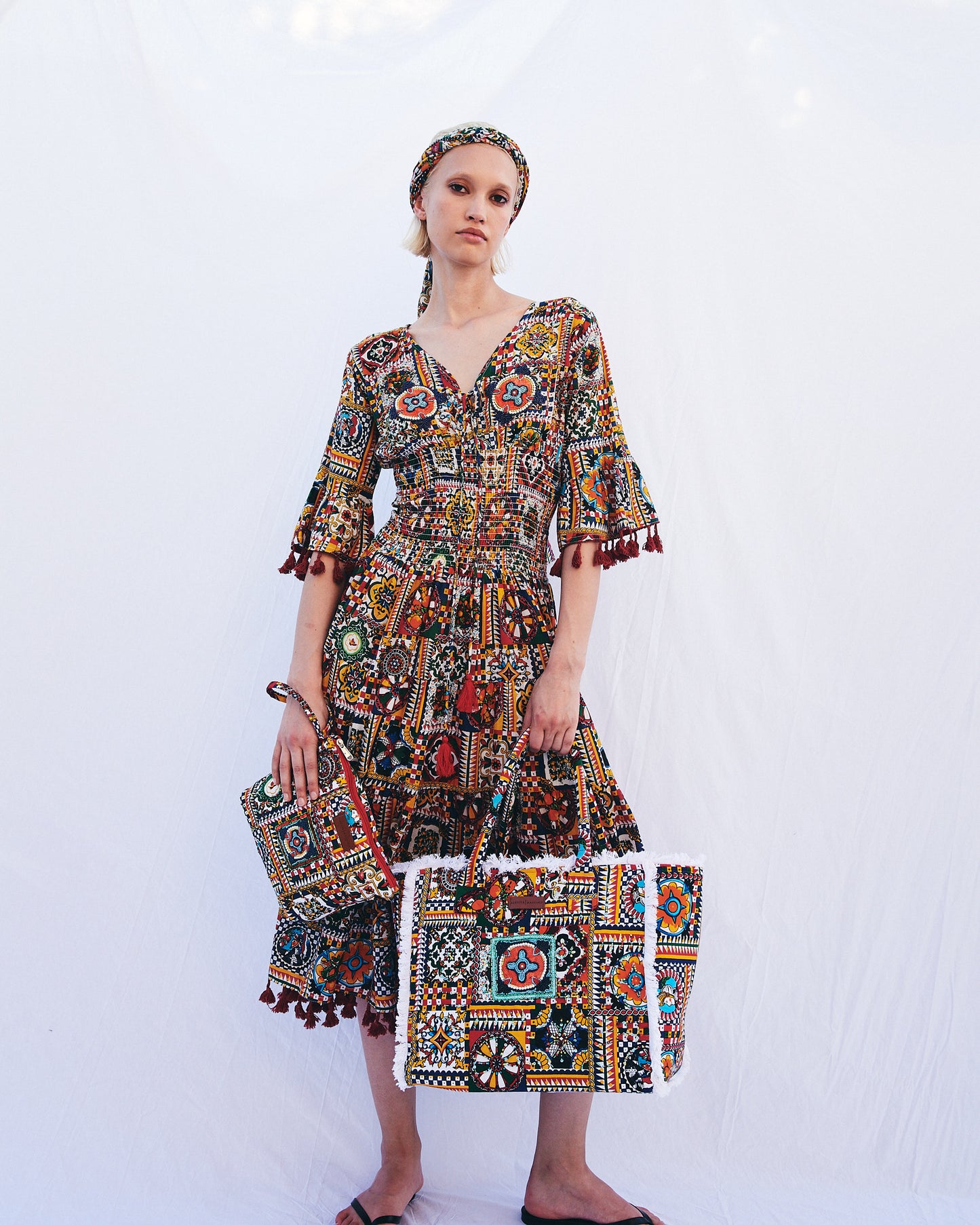 Boho Midikleid mit folkloristischem Patchwork-Print und Quasten - Kleid